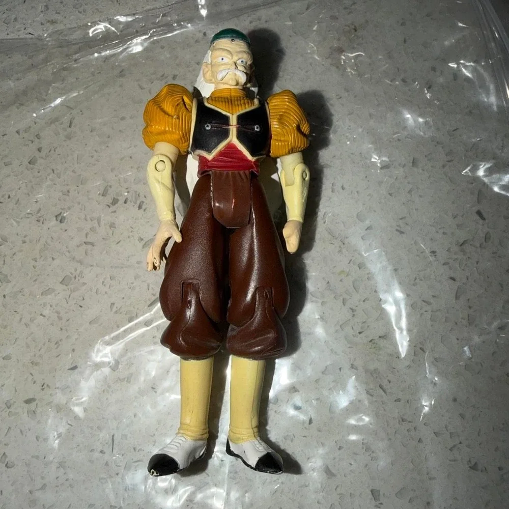 Dragon Ball Z lot of 8 action figures with orange jumpsuit, blue boots and belt
